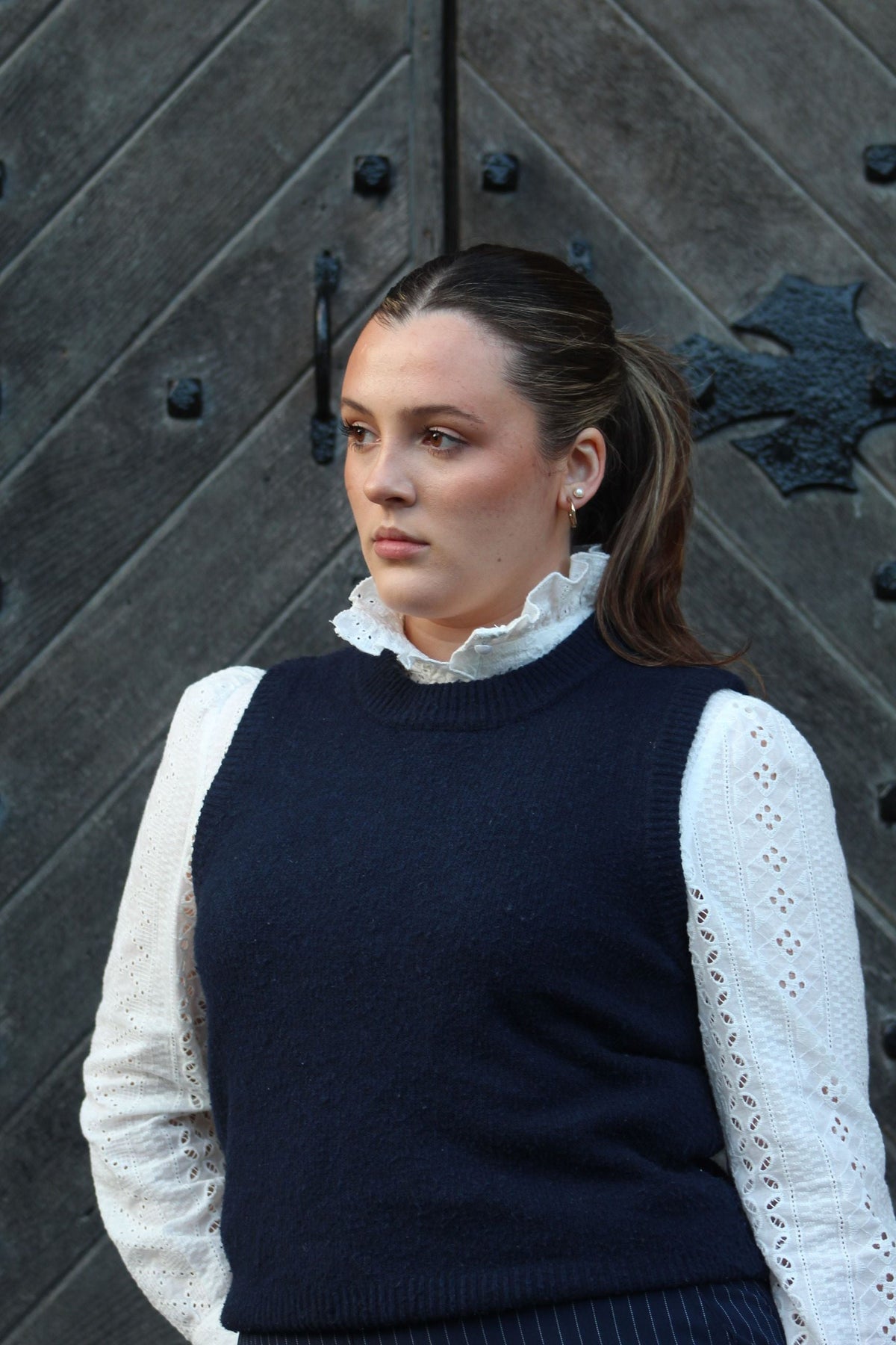 With your favourite knitted vest